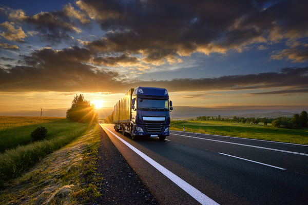 Delivery-Trucks-on-the-highway-morning-Stock-Photo-01
